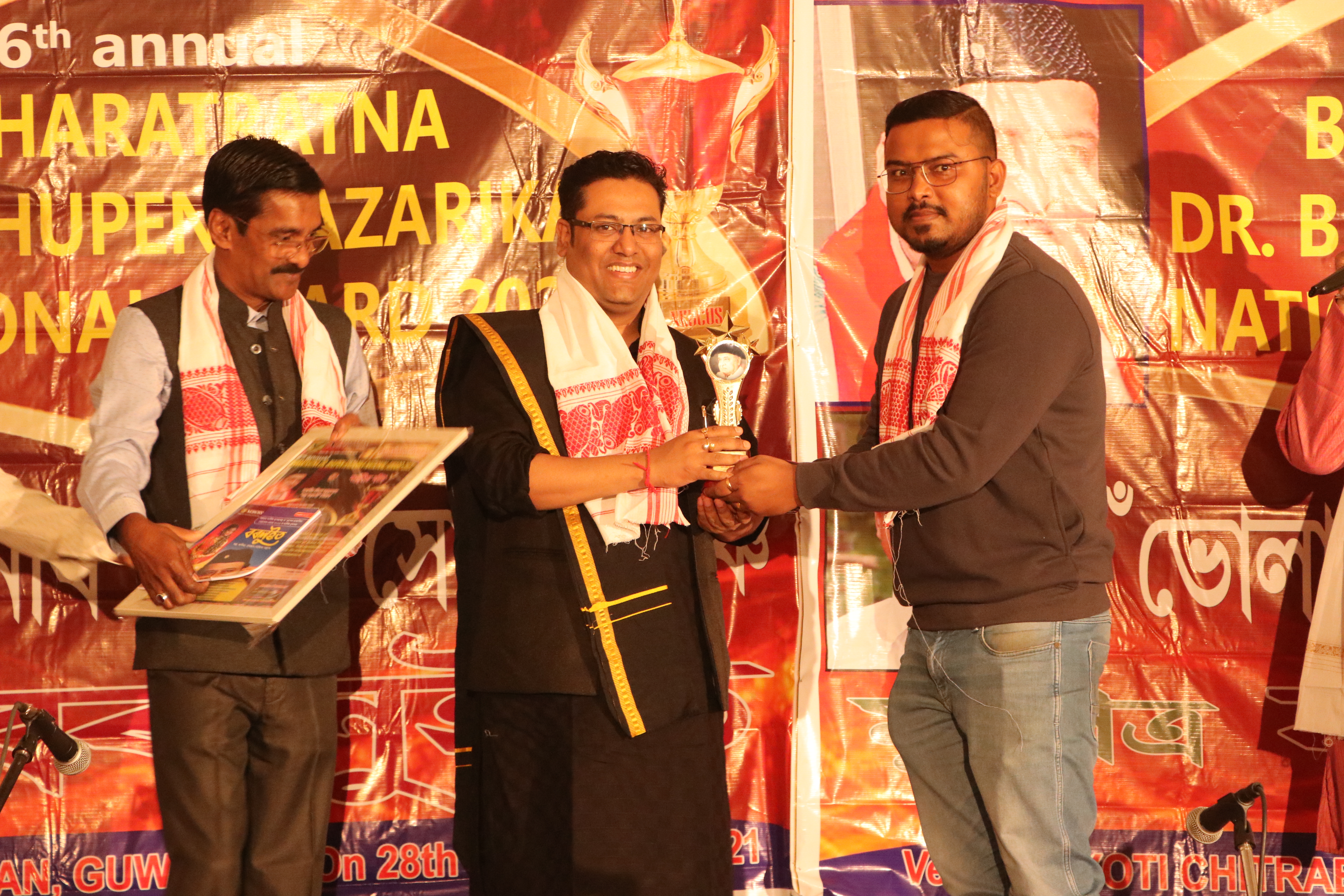 Dr. Vikram Talukdar receiving an award — recognition 2